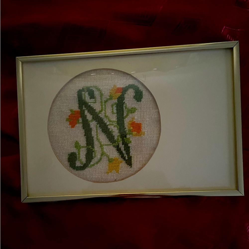 Embroidered/cross-stitched/needlepoint framed initial 'N'